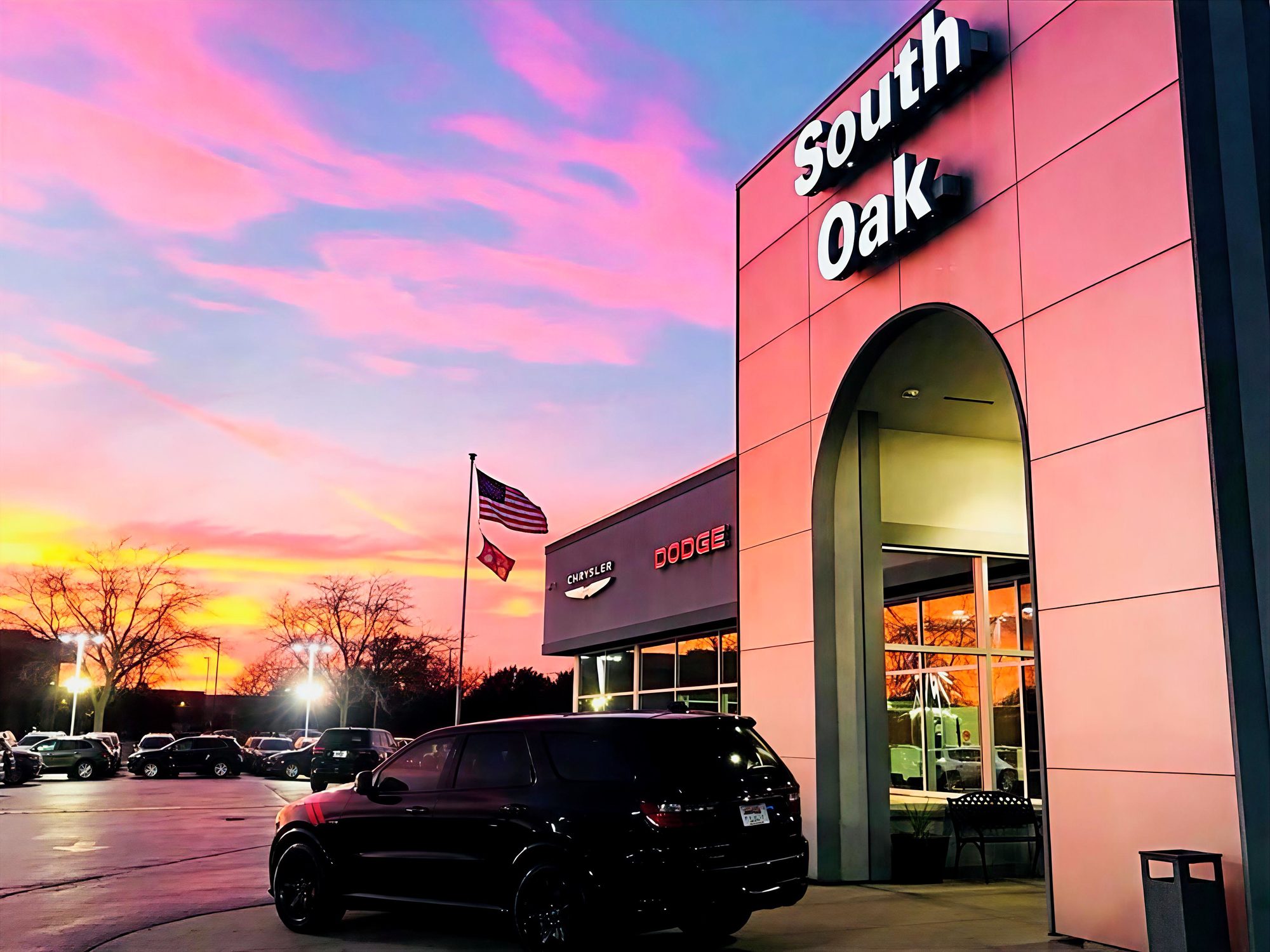 South Oak dealership at sunset